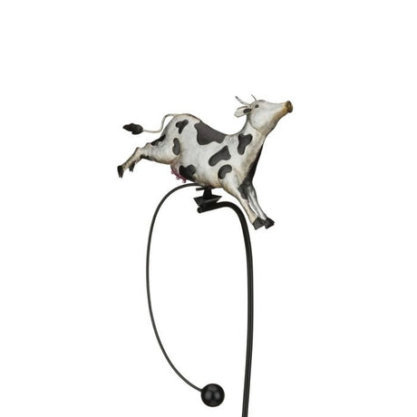 galvanized metal finish with gold accents and a weighted arm that gently rocks the cow figure back and forth in the breeze