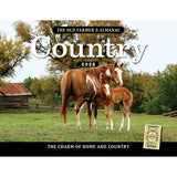 The cover image for the Old Farmer's Almanac Country Calendar 2026 featuring a photo of a Mare and her Foal in a sunny green pasture