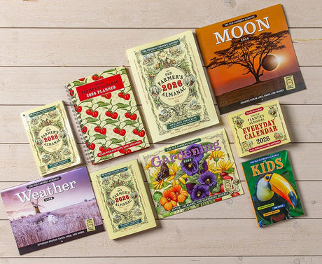 A collection of 2026 almanacs and calendars published by The Old Farmer's Almanac