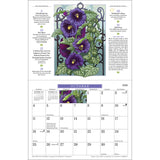 the interior page of the Gardening calendar showing the October page with moon phases, holidays, and an illustration of deep purple blooms growing up an ornate garden trellis