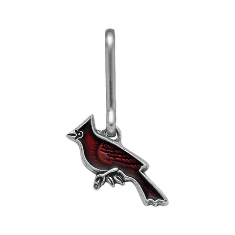 A pewter zipper pull in the shape of a brilliant red cardinal in profile hanging from a clip to affix it to any zipper