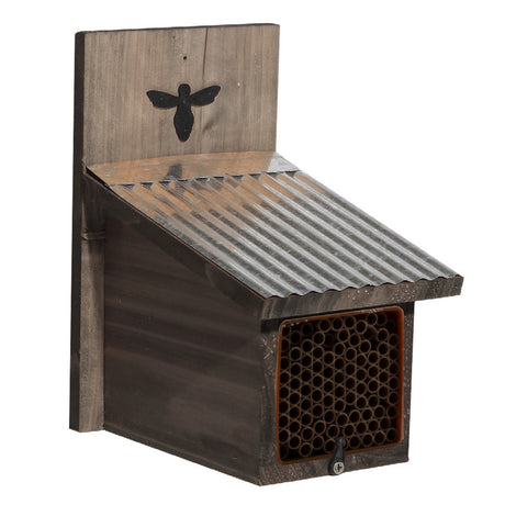 The rustic mason bee house with 94 nesting tubes, corrugated metal roof, and bee emblem