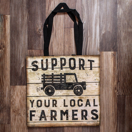 a square woven nylon market tote with wooden plank print and a graphic of a pick up truck that reads "Support Your Local Farmers"