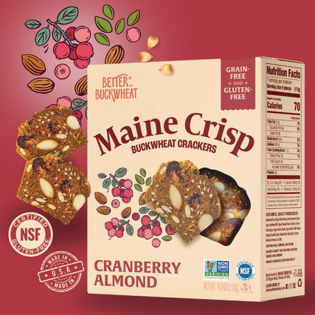 Maine Crisp Cranberry Almond Crisp box against a cranberry red background with images of ingredients
