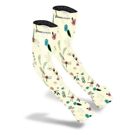 the protection sleeves in a creamy off white color with a repeated pattern of dragonflies, flowers, and leaves