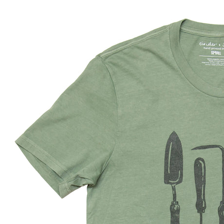 a close up of the shoulder of the Garden Tools tee showing the soft wash of the fabric and some print detail