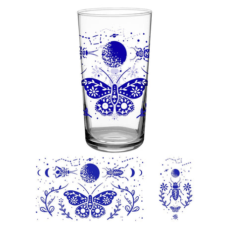 a clear glass tumbler printed with vintage inspired blue print of a moth beneath a full moon and beetles and flowers above the full wrap artwork that is on the glass