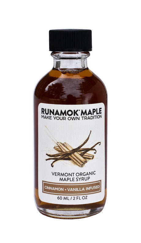 a bottle of the cinnamon and vanilla infused maple syrup from the pantry favorites collection against a white background