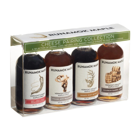 a clear gift package of 4 small bottles of maple syrup that pair well with cheese