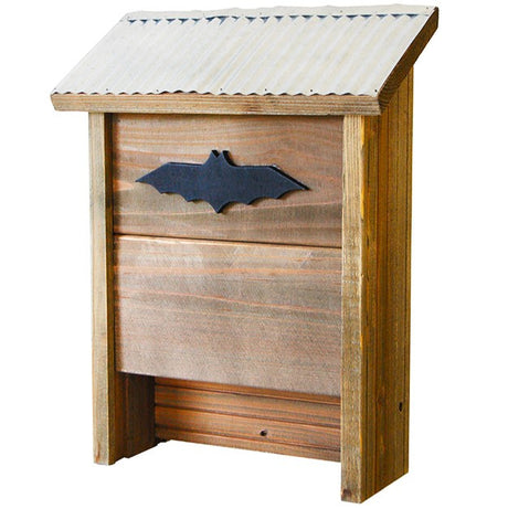The rustic farmhouse bat house with rustic wood construction, corrogated metal roof, and black bat emblem