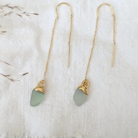 authentic piece of aqua sea glass dipped in real 14k gold suspended on 14k gold filled threader-style chains