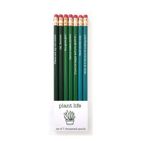 Set of 7 sharpened pencils with plant-themed packaging on a white background
