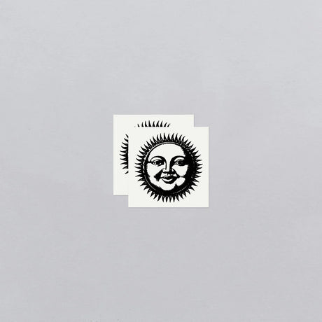 two vintage sun illustration temporary tattoos