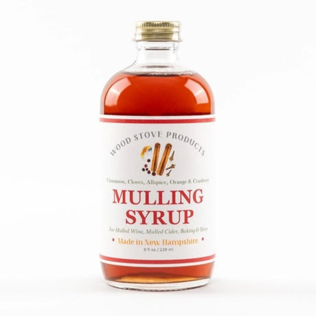8oz mulling syrup bottle showing the warm colored amber liquid inside