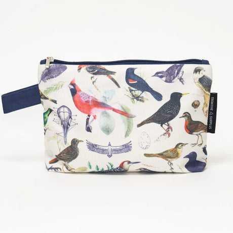 a white canvas zipper pouch with vintage illustrations of various birds all over. the pouch has a navy blue strap for easy carrying