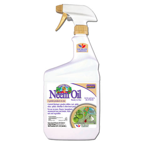 a white bottle of Captain Jack's Neem oil in spray bottle